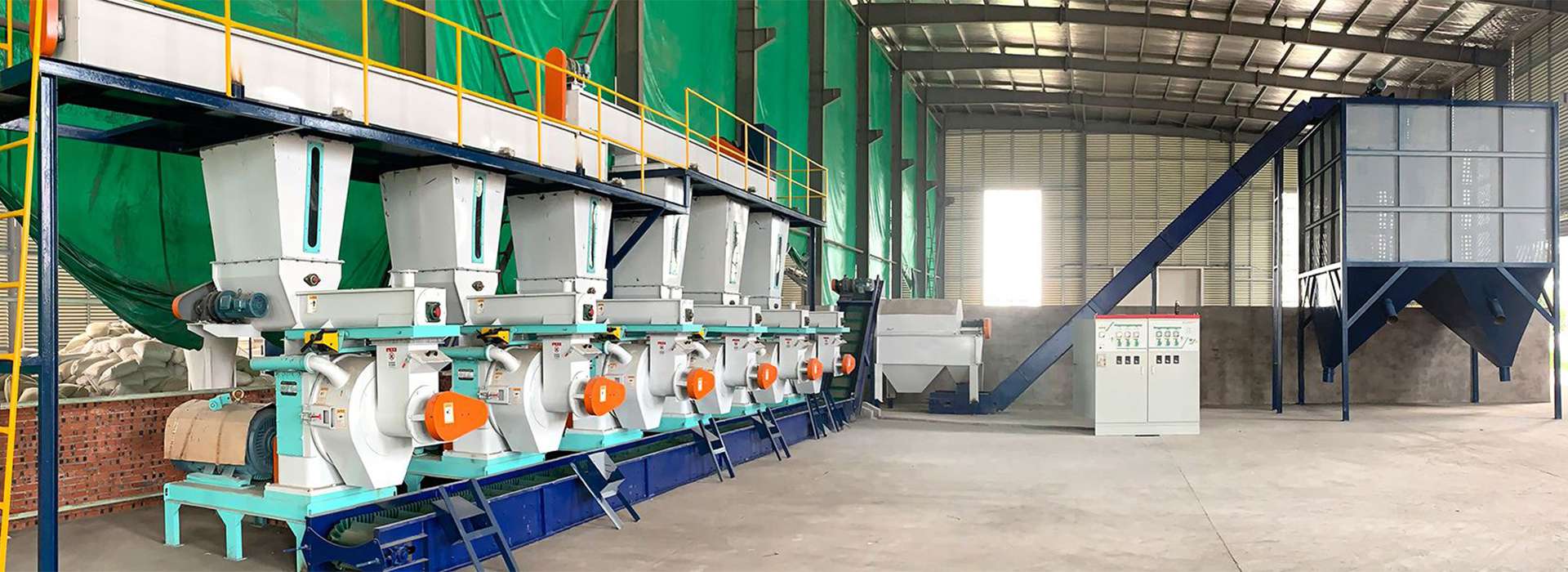 Flat die feed pellet machine